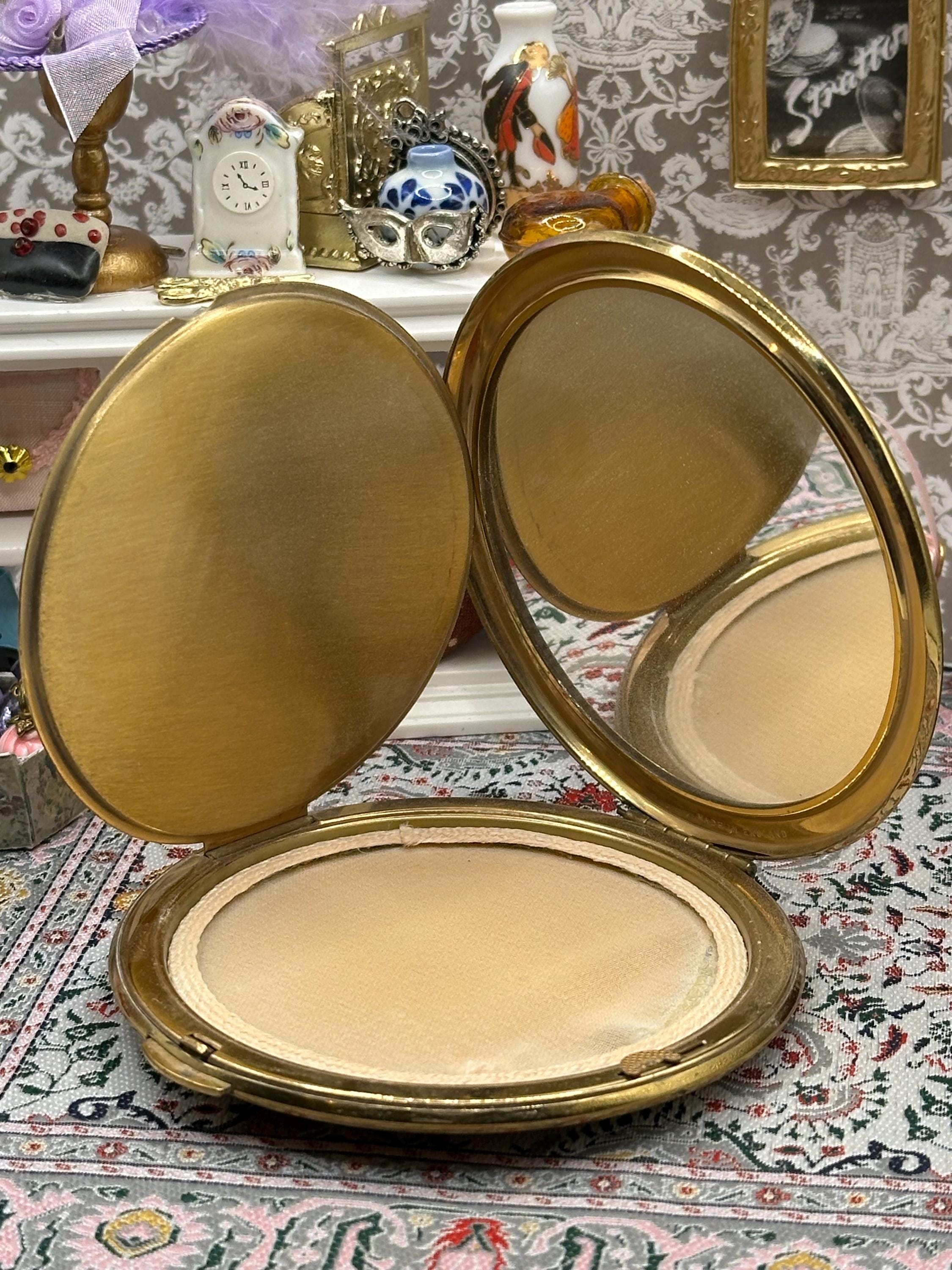 Vintage Kigu Powder Compact – Large Gold‑Tone Floral & Ribbon Design