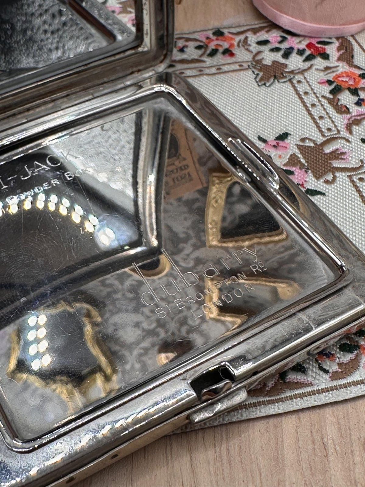 Vintage Dubarry Vani-Jack Loose Powder Compact, Wavy Engine Turned Silver Tone with Enamel Floral Trim